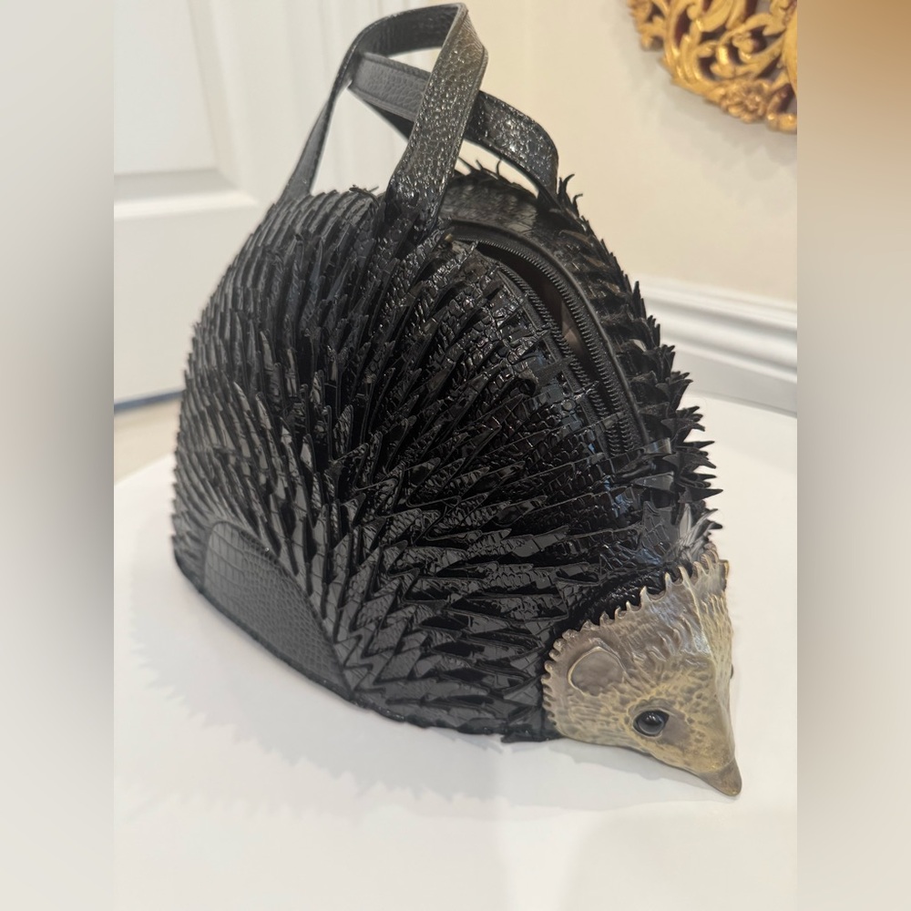 Black and gold Hedgehog/porcupine purse/handbag. Brand new with tags.‎